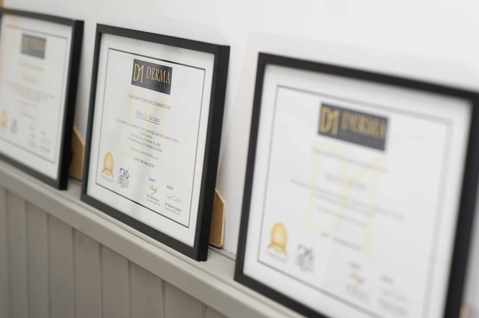 Certificates in frames along a wall.jpeg