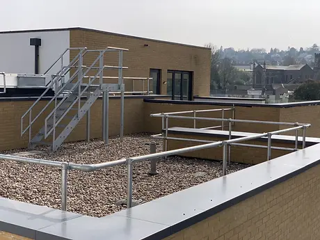 Metal railings around roof edge