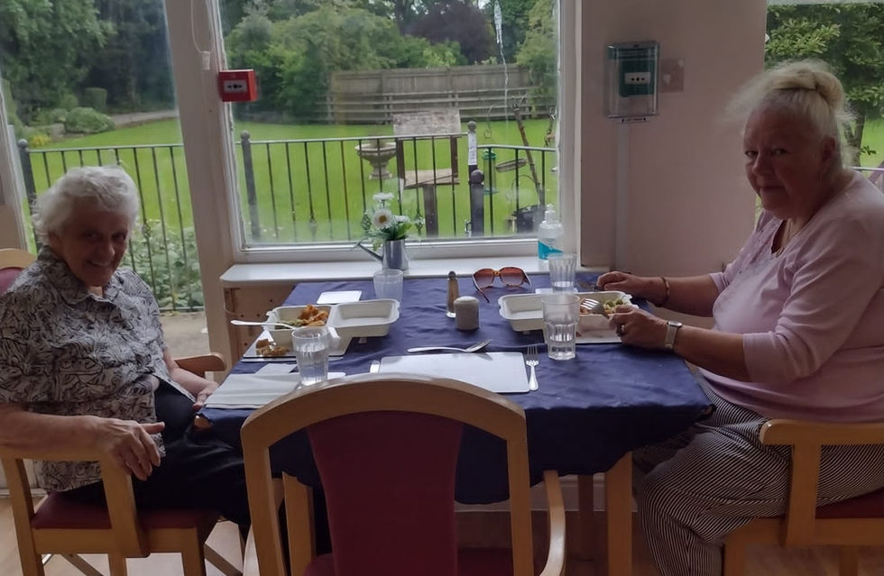 Two residents sat at table