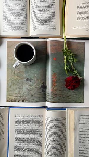 Open books with coffee cp and rose flower by pexels-jill-burrow-6858626