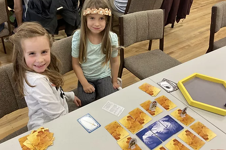 girls playing Hoard.webp
