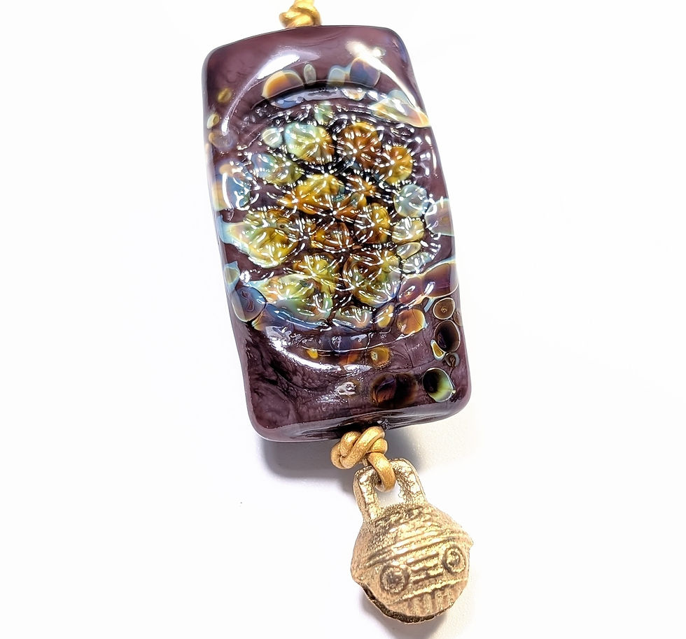 Thumbnail: Third eye heart and bell necklace pendant close up back view