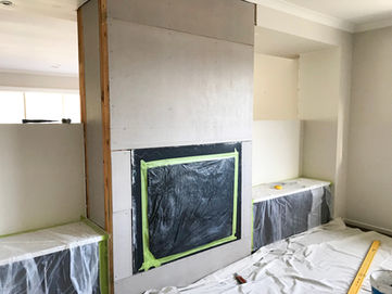 Modern fireplace installation in progress