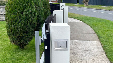 Modern black gate and intercom system