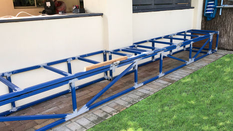 Blue metal frame garden structure outdoors