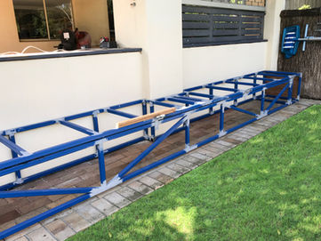 Blue metal frame garden structure outdoors
