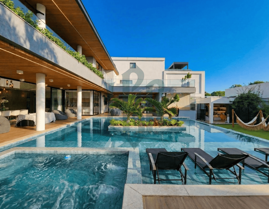 Área de lazer com piscina e gourmet do imóvel duplex de luxo a venda no condomínio Villagio Felicitá na Barra da Tijuca - RJ.