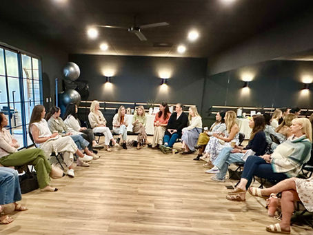 Women sitting together at a meeting