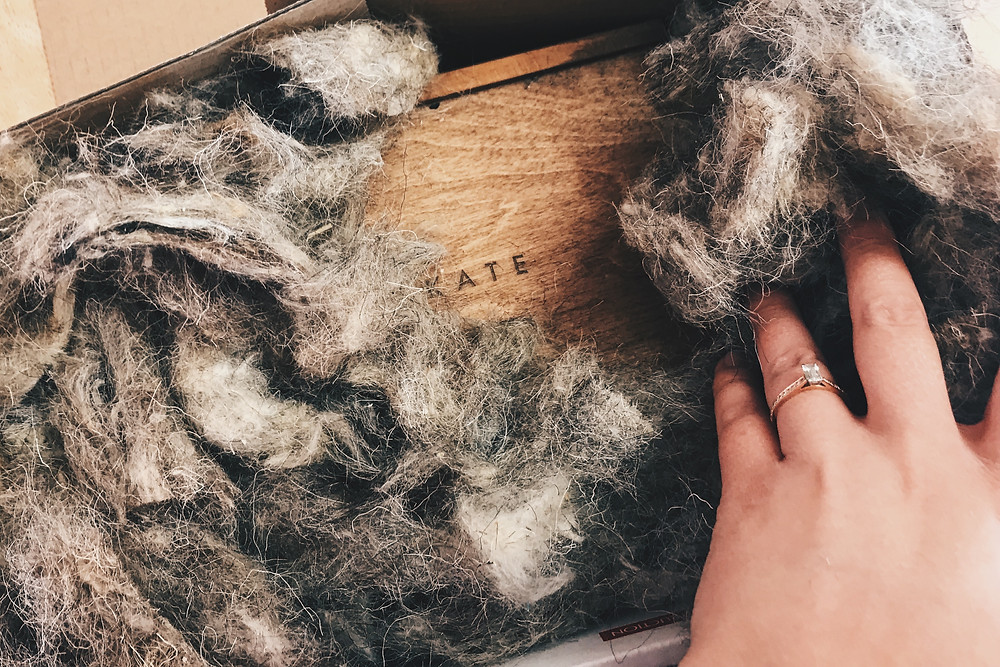 unboxing wooden usb print box with recycled sheets wool packaging Claire Bemister photography