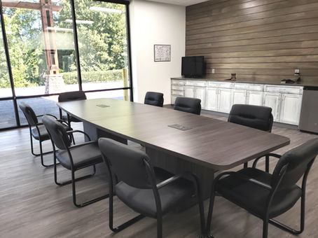 12ft Conference Table with Storage Legs and Chairs in Designer Boardroom