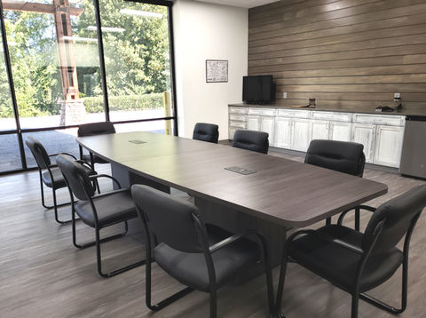 12ft Conference Table with Storage Legs and Chairs in Designer Boardroom