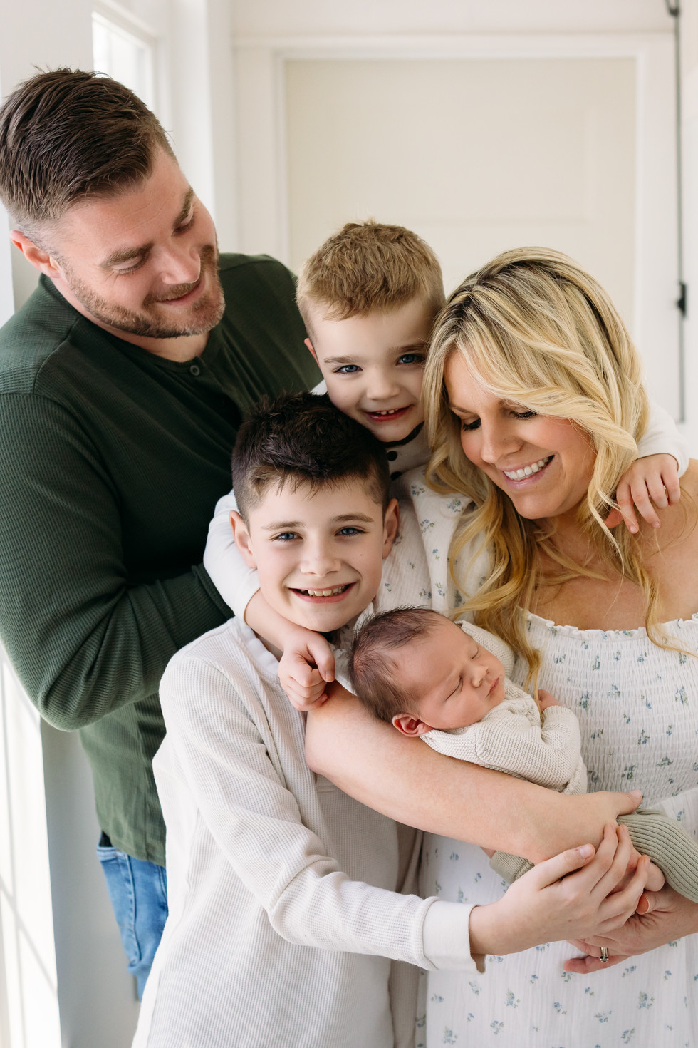 loving newborn family photo