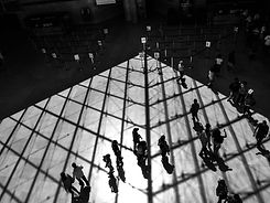 high-angle-view-people-walking-floor-with-shadow-ceiling.jpg