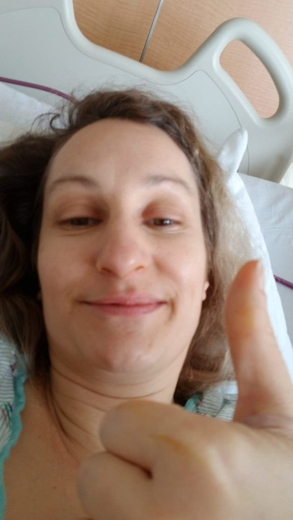 Woman in hospital bed