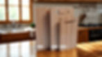 Thumbnail: The image showcases three light-colored wooden cutting boards of varying sizes, each with a handle cut-out at the top. The cu