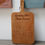 Thumbnail: The image features a custom wooden cutting board etched with the text "Granny Pat's Plain Scones," with a handwritten recipe