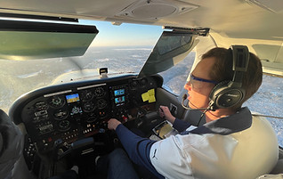 man flying plane
