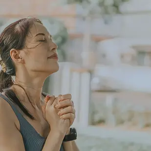 a woman looking out of the window thinking about the power of belief
