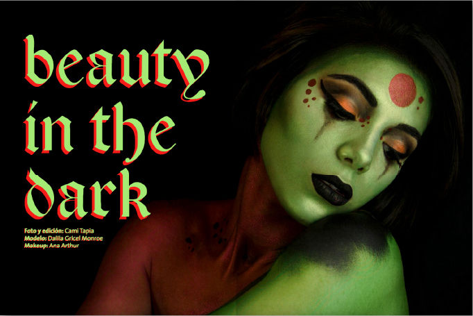 spooky green colorful make up on a girl
