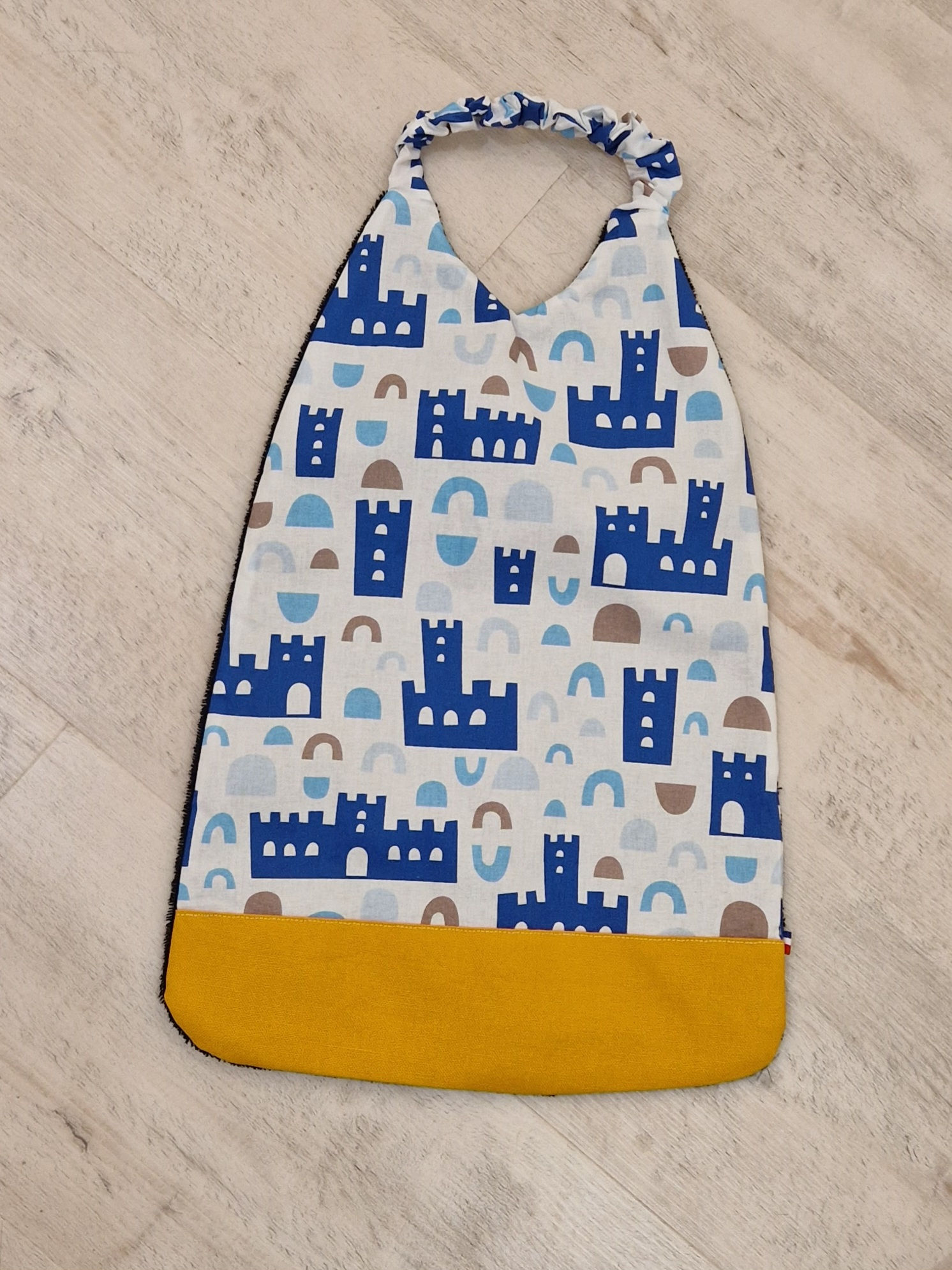 Bavoir serviette Élastiqué château fort