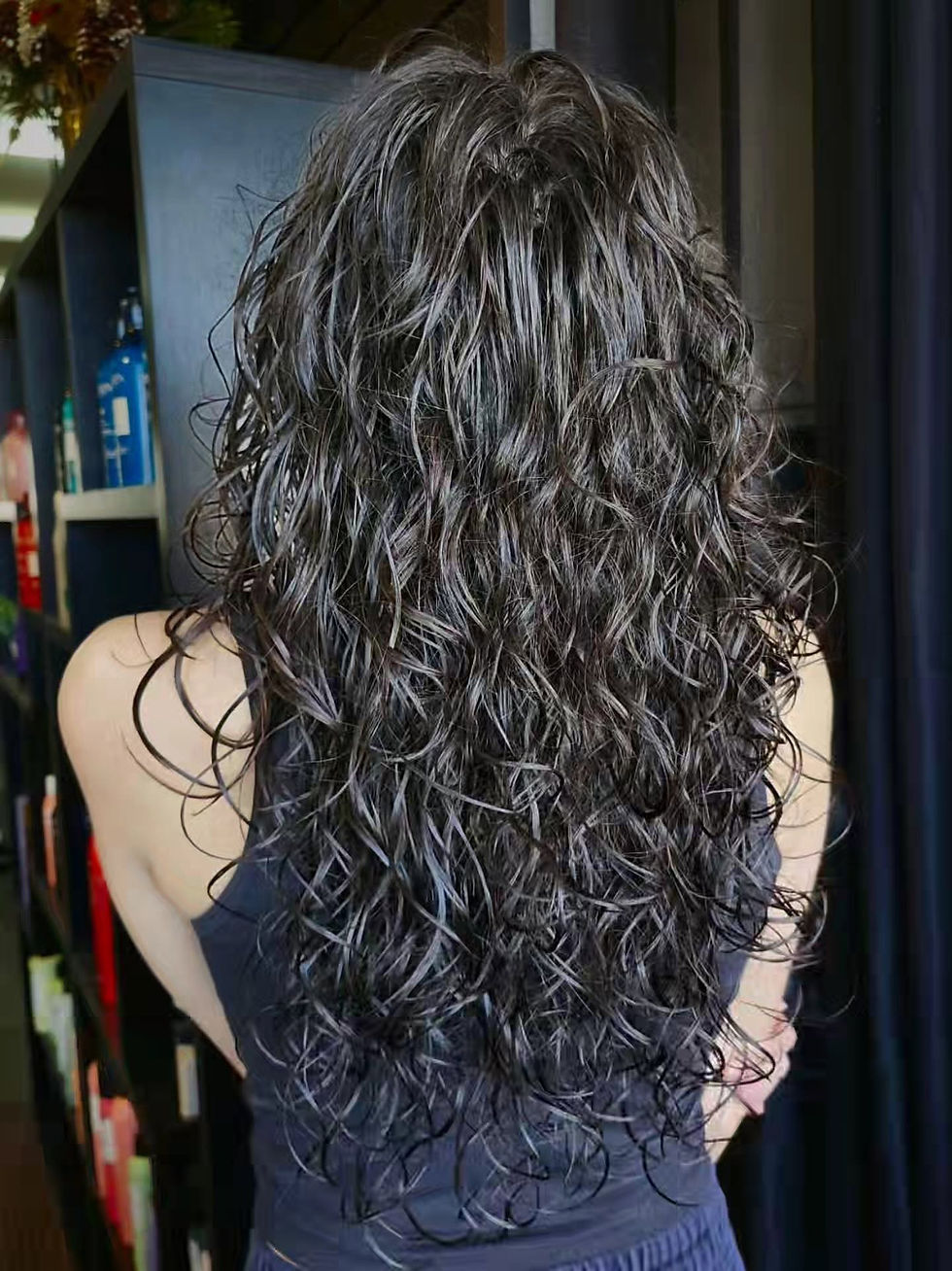 Curly haircut and styling at House of Holloway Salon