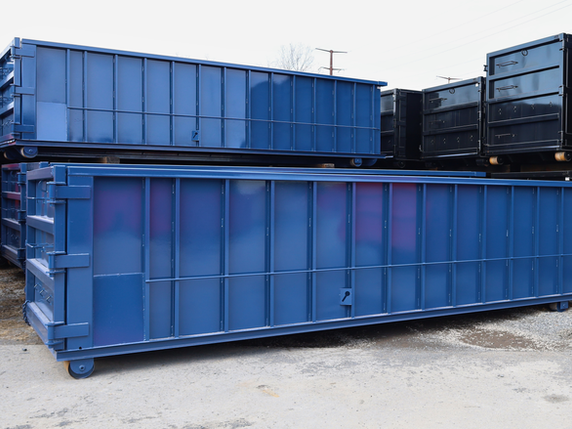 A stack of channel roll-off containers painted blue