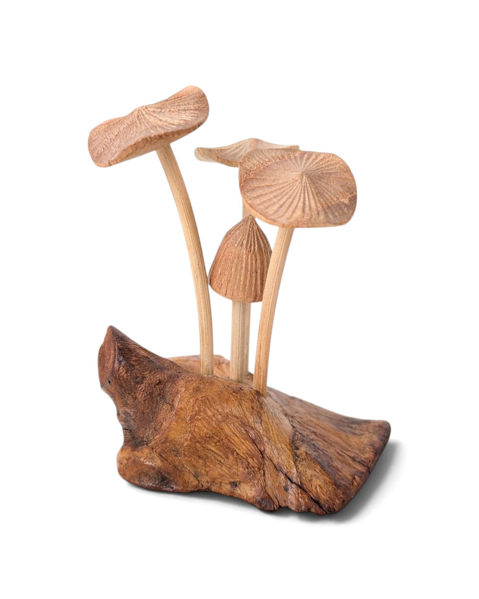 Small hand-carved natural wood mushroom cluster