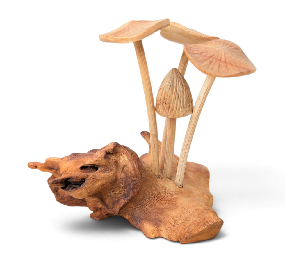 Small handcrafted mushroom figurine made from natural wood