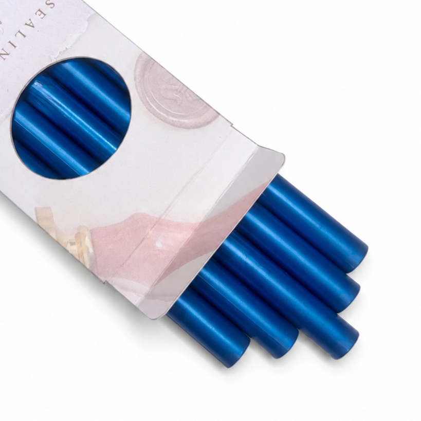 Close up sealing wax sticks in packaging with white background