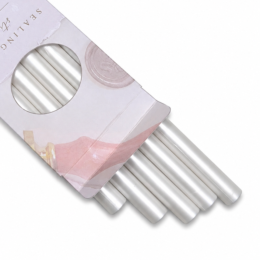 Close up sealing wax sticks in packaging with white background