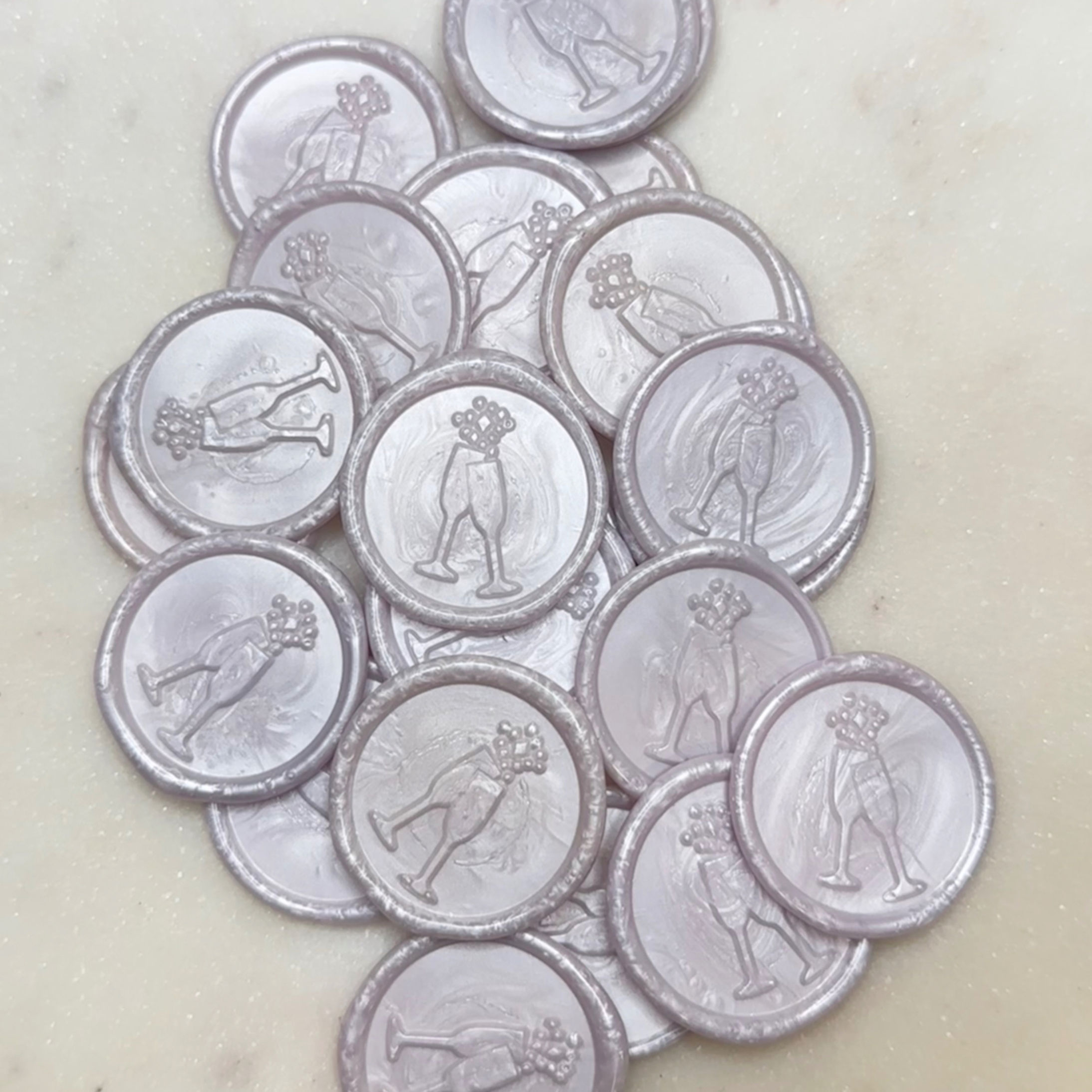 Bunch of Lavender Wax Seals with Champagne Glasses Clinking and Bubbles Coming out