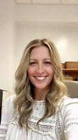 Assistant principal sitting at desk.