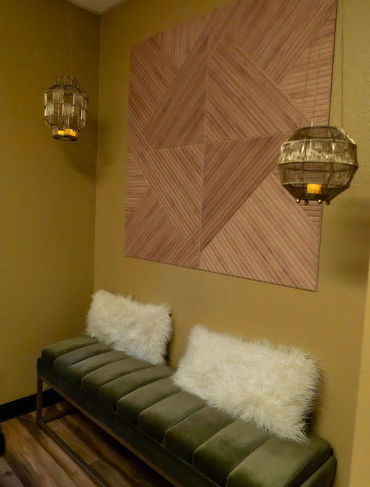 Seating area in Reiki treatment room at Thrive Hive Health in Upland, CA