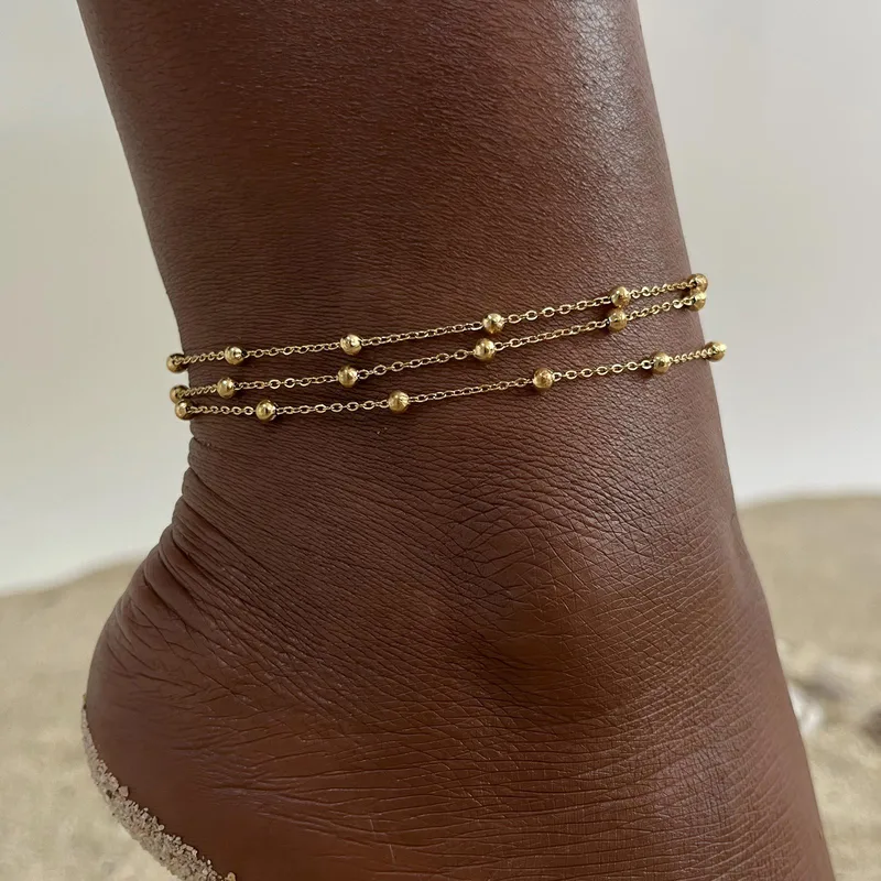 leg showcasing 3 layer beads anklet