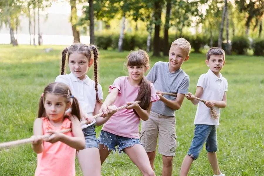 Kids making friends at summer camp