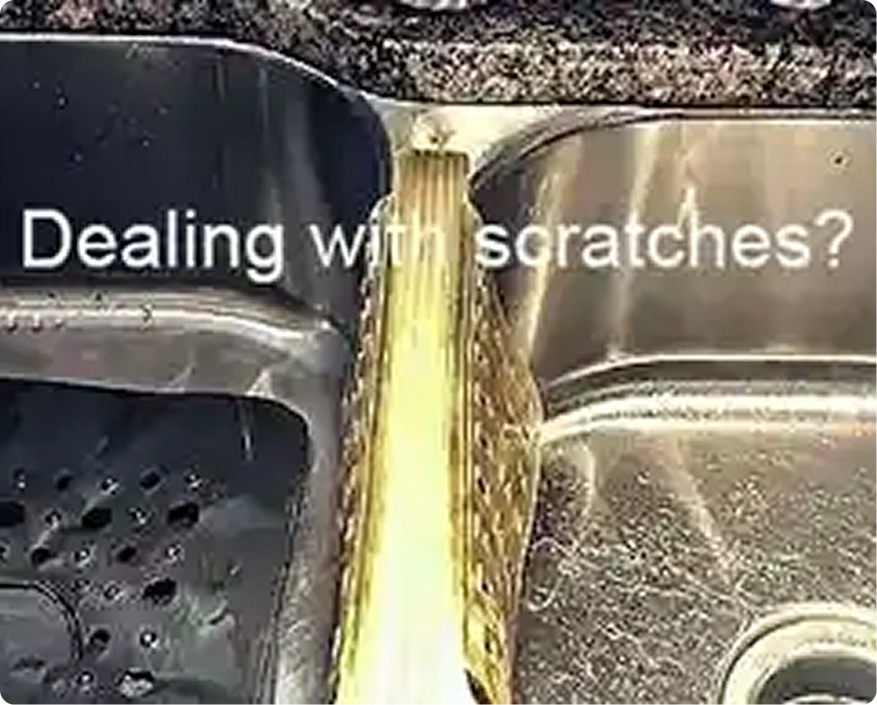 Dealing with scratches? Metal sinks side by side, one scratched and one clean.