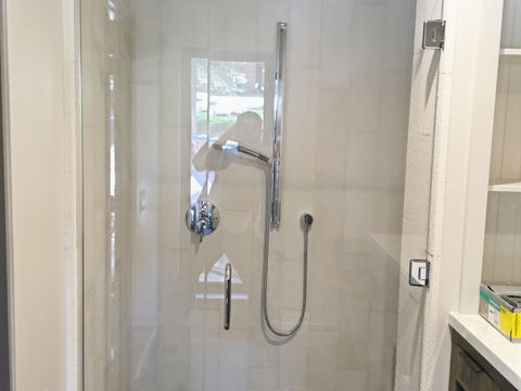 Natural stone tile shower.