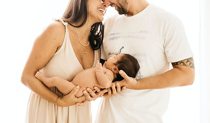 man in white crew neck t-shirt kissing woman in white dress_edited_edited.jpg
