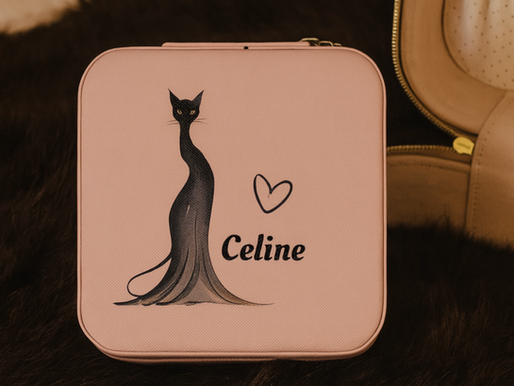 A Personalized Pink Jewelry Box with a Black Cat Illustration