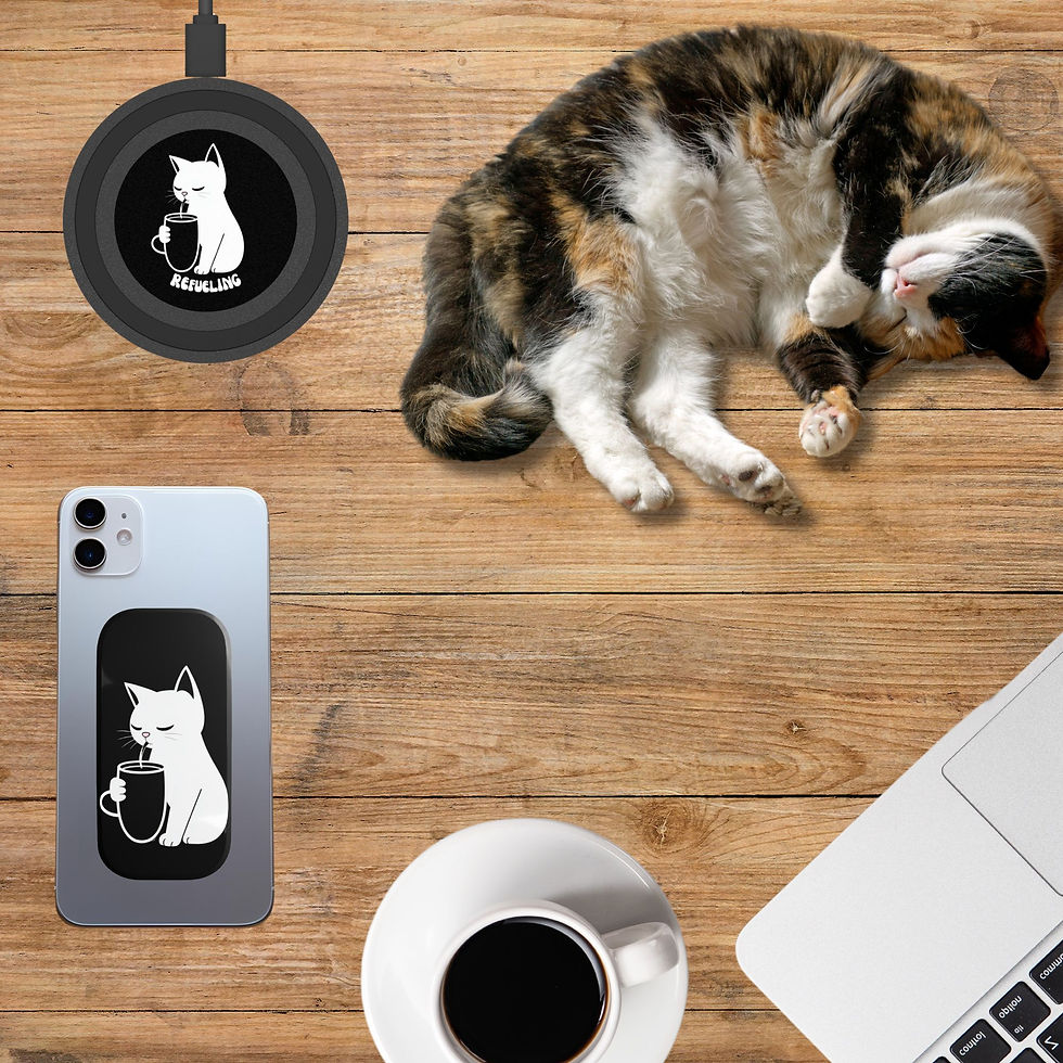 Refueling Wireless Charger Shown with Companion Phone Grip on a Wood Desk with a Calico Cat, a Cup of Coffee and a Laptop
