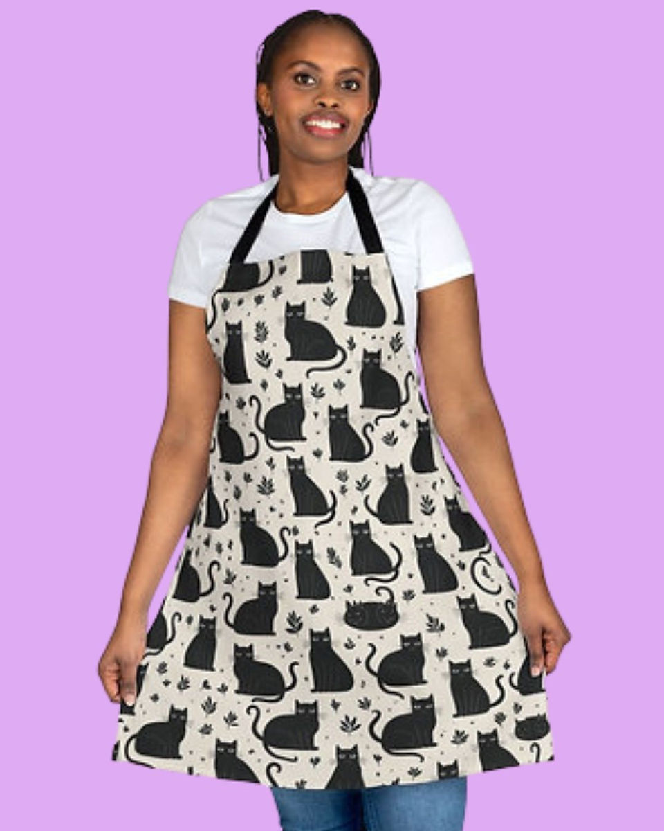 Mom wearing black cat apron, unique Mother’s Day gift