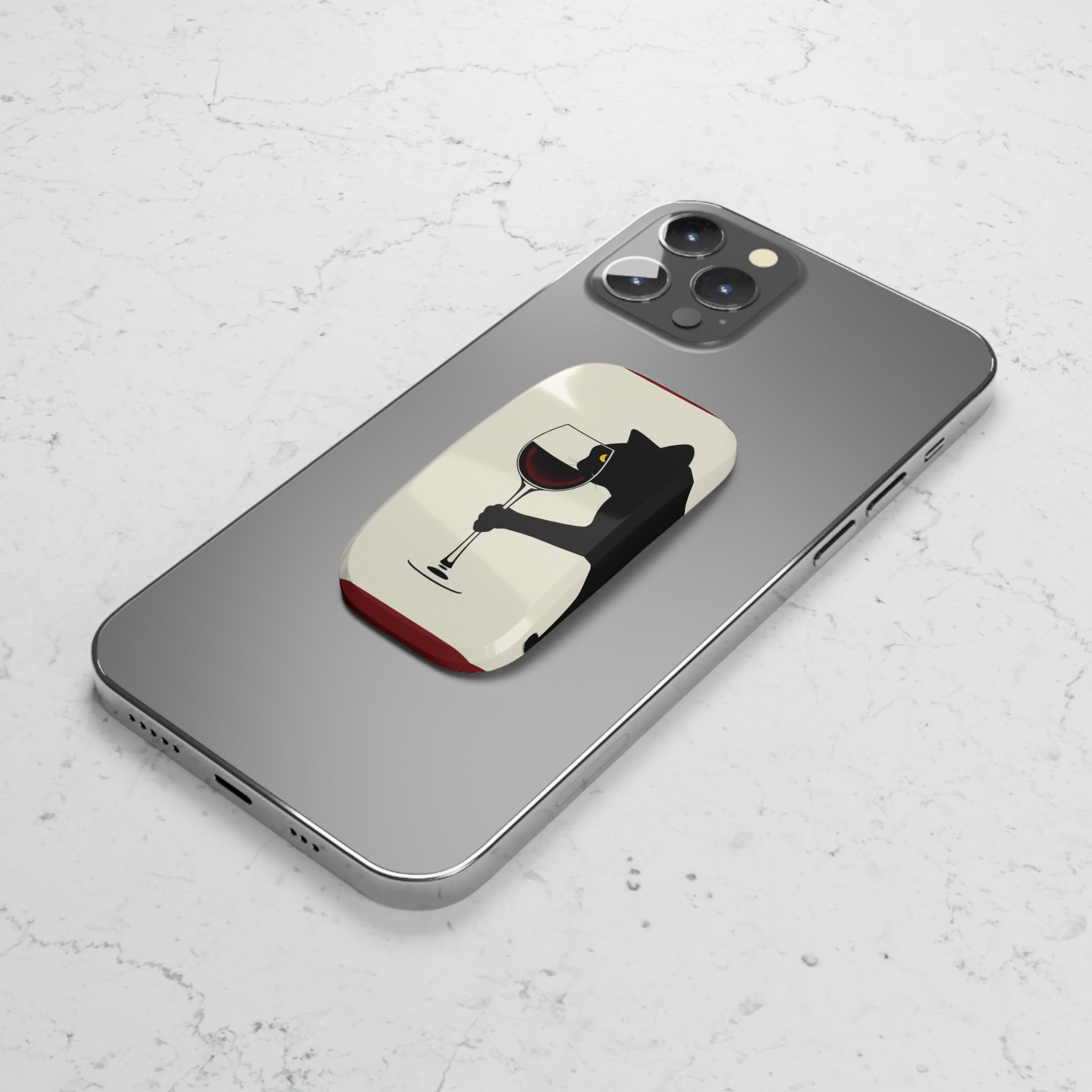 Funny Phone Grip Shown Horizontal on Silver Cell Phone
