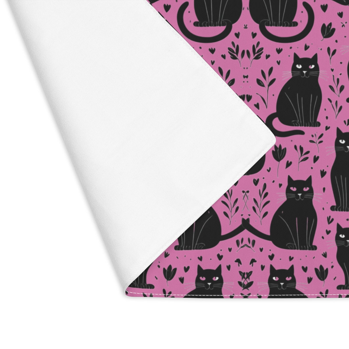 Pink Halloween Placemat folded to show white flip side
