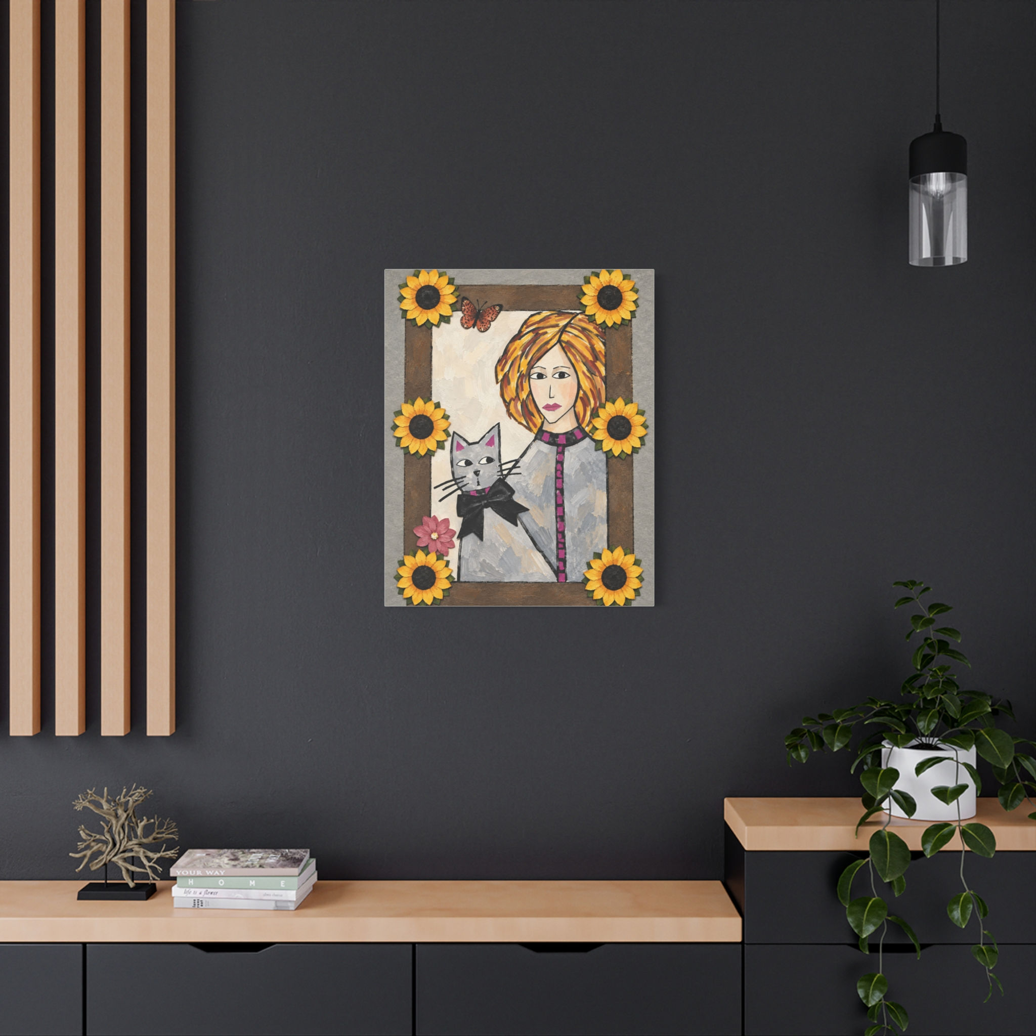 Moody room with a whimsical print of a woman and her cat