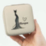 Video of a woman holding the ivory high fashion black cat jewelry box with the name Morgan