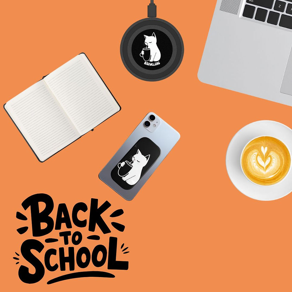 Back to School Image Featuring a Book, Laptop, Cappuccino and a Comfort Diva Wireless Charger that says "Refueling" and has a design of a cat drinking coffee with a matching cell phone holder