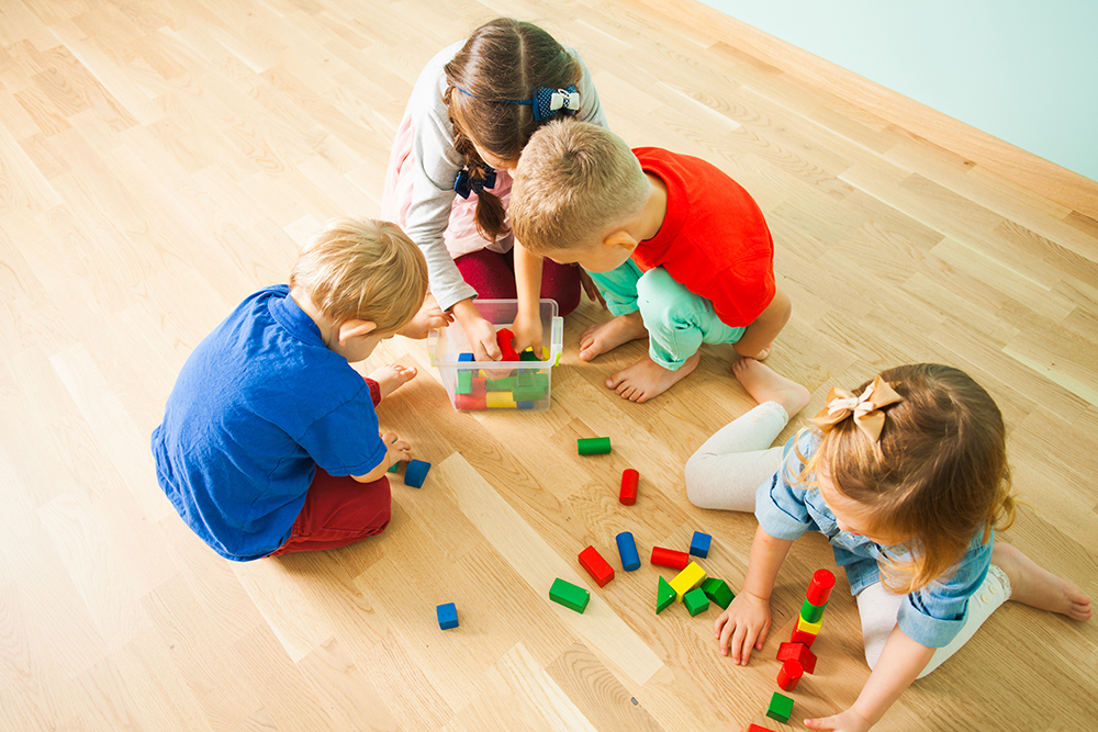 Children-playing-with-blocks-Child-Care.jpg