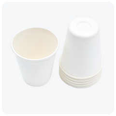 9 oz brilliant white compostable cups made from sugarcane bagasse, durable plant-based fiber disposables from Reharvest, show