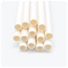 No-Sog brilliant white disposables straws made from sugarcane bagasse from Reharvest, shown neatly stacked on a light backgro