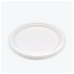 10-inch brilliant white disposable plant-based fiber round plate made from Reharvest, shown on a light background.